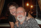 man and a woman smiling at camera